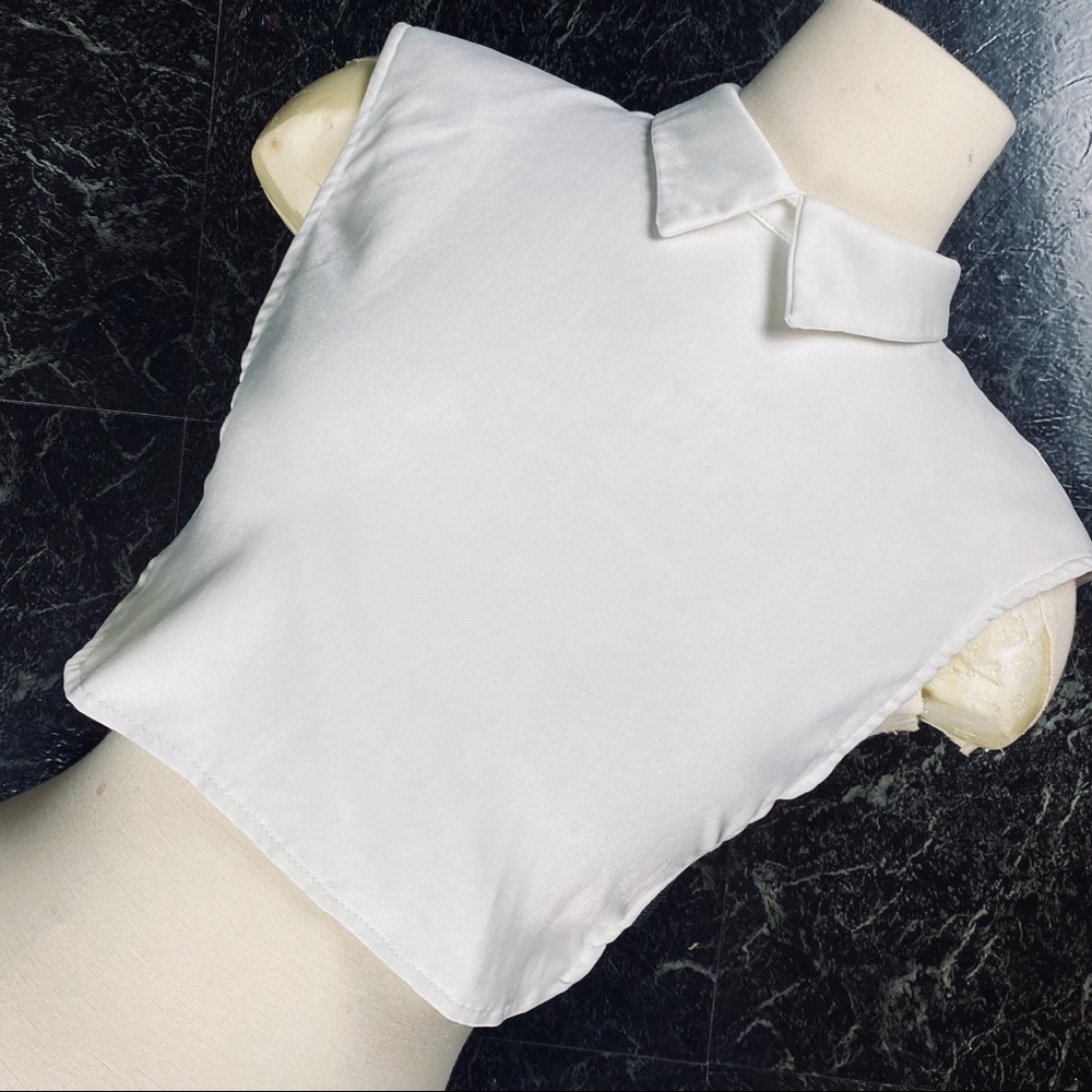 Edgy white collared crop top with open sides